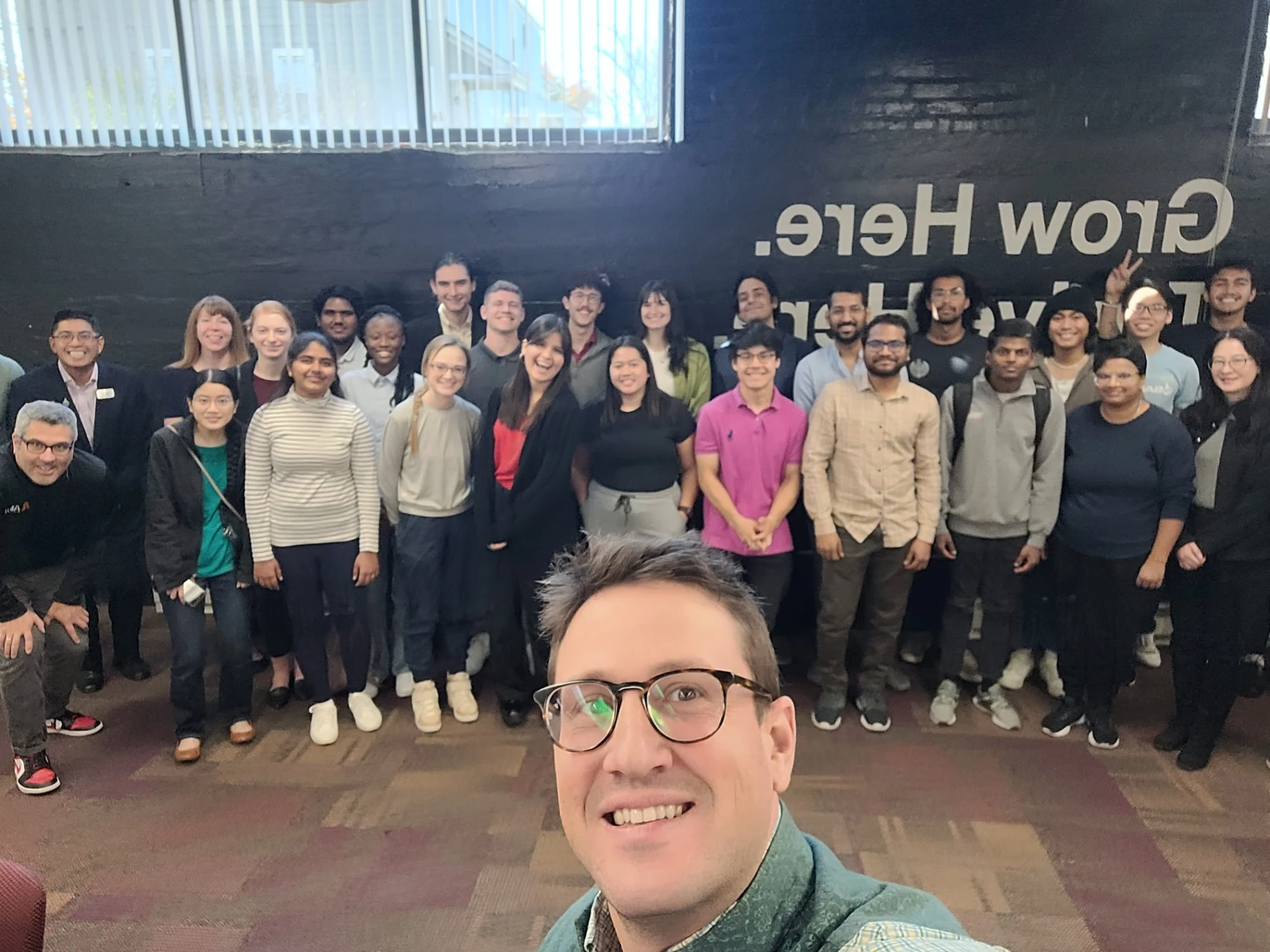 Jeremy Fritzhand with a group of students and founders
