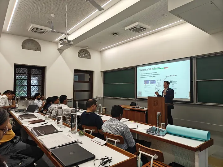 Jeremy Fritzhand leading a masterclass at a podium in front of a classroom